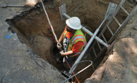 construction worker in a hole