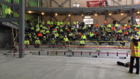 Workers on a Shawmut project observe a training session