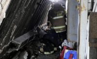 Boston EMS rescue workers after a catwalk collapse at a jobsite