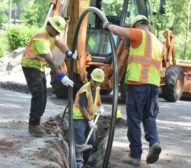 PSE&G crew members install new plastic gas main in Montclair NJ.jpg