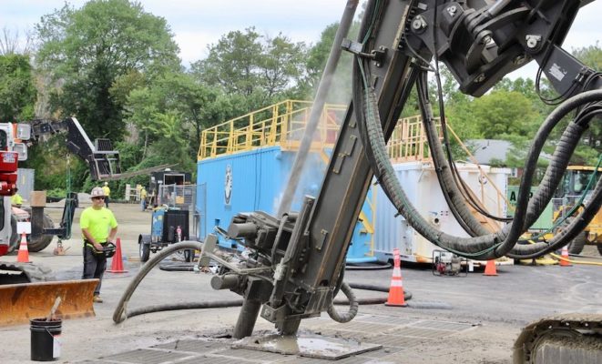 Crews drill a geothermal borehole in Framingham, Mass.
