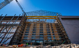 wide angle shot of the under-construction of the Smithsonian's National Air and Space Museum, with scaffolding across the facade