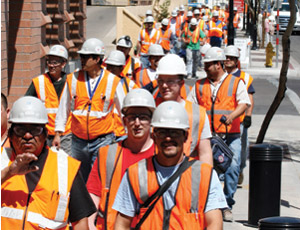 Crews are back to work in downtown Phoenix as shift change occurs at the 14-story Maricopa County Court Tower. The estimated payroll for the 1,600 workers on the tower is $107 million. More than 10% of the contractors are small businesses that are owned by women or minorities. Photo: Maricopa County