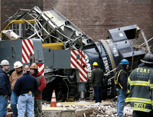 The 200-ft-high tower crane toppled as crews attempted to “jump,” or extend, it from the 18th floor of a high-rise condominium under construction in midtown Manhattan. 